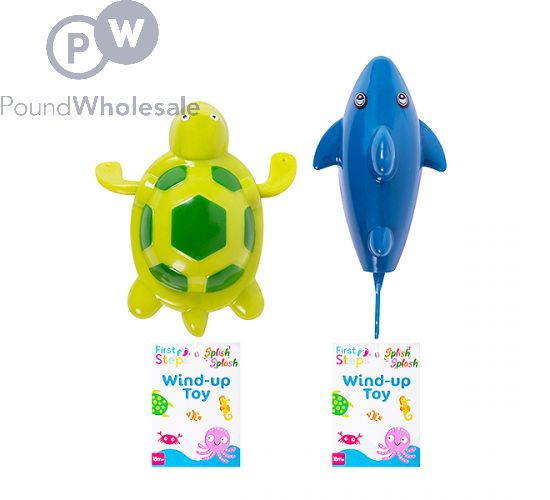 Wind up bath toys top
